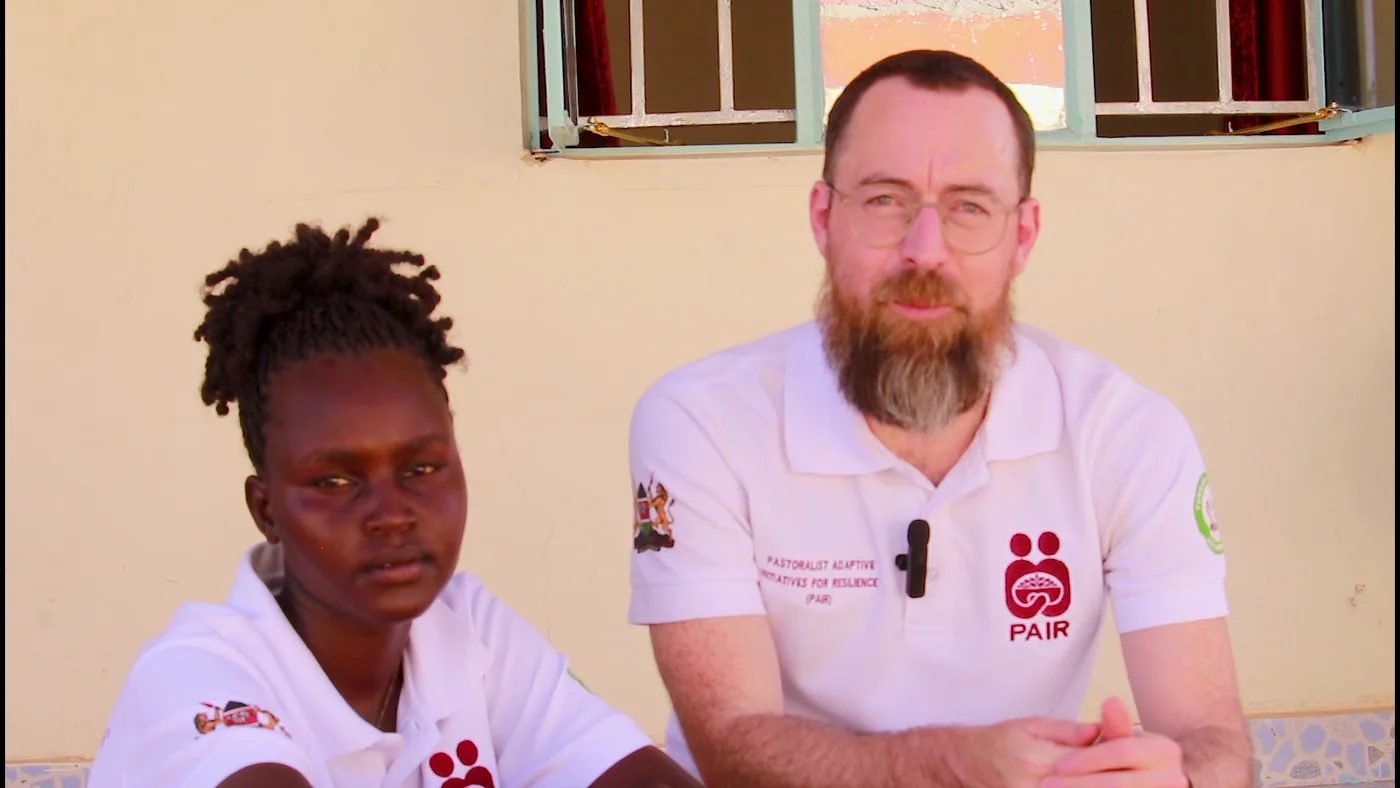 Diana Lokol and Dr. Evan Griffith sitting together outside.