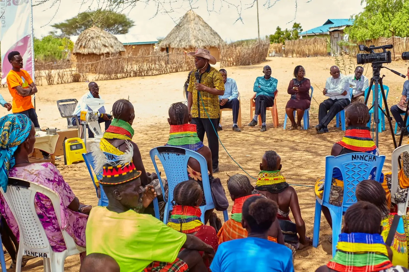 Community members seated at the launch of the solar mill in Natoot.